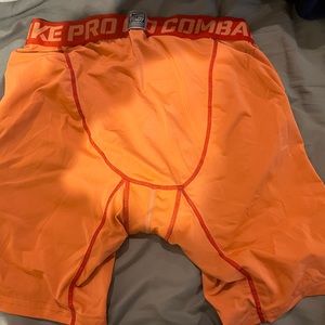 Men’s orange Nike Pro Combat compression shorts